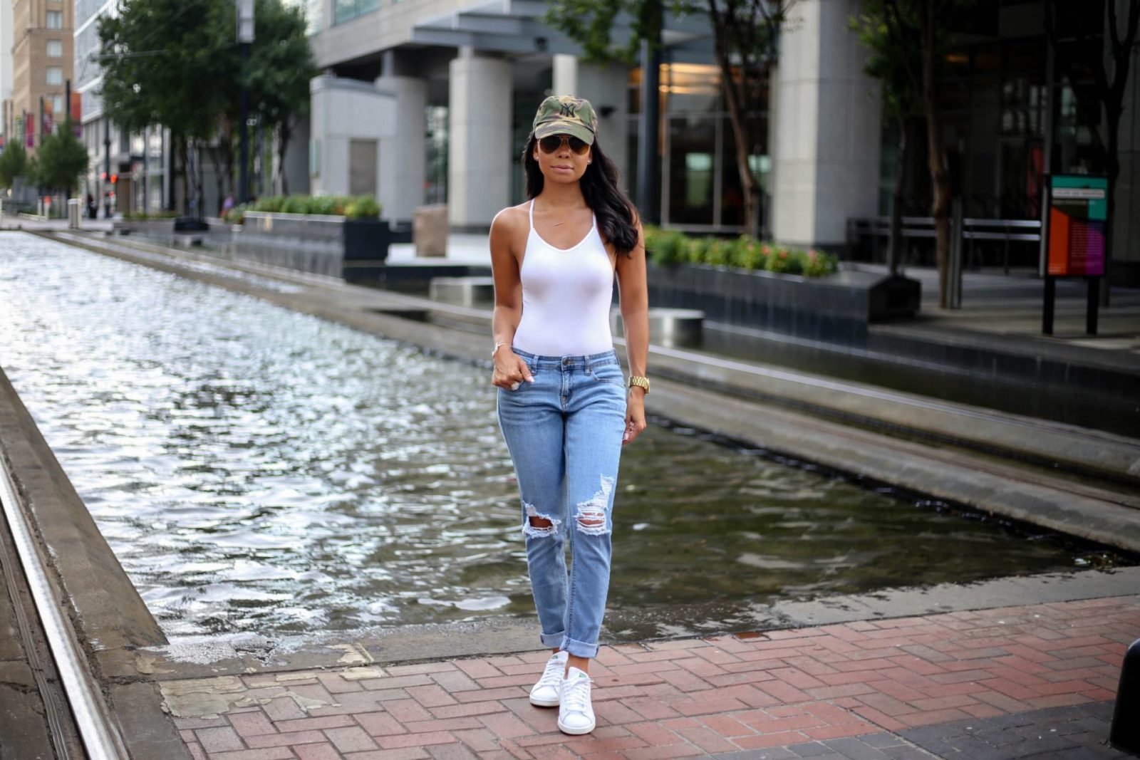 Weekend Style with distressed denim, white body suit and Stan Smith Adidas
